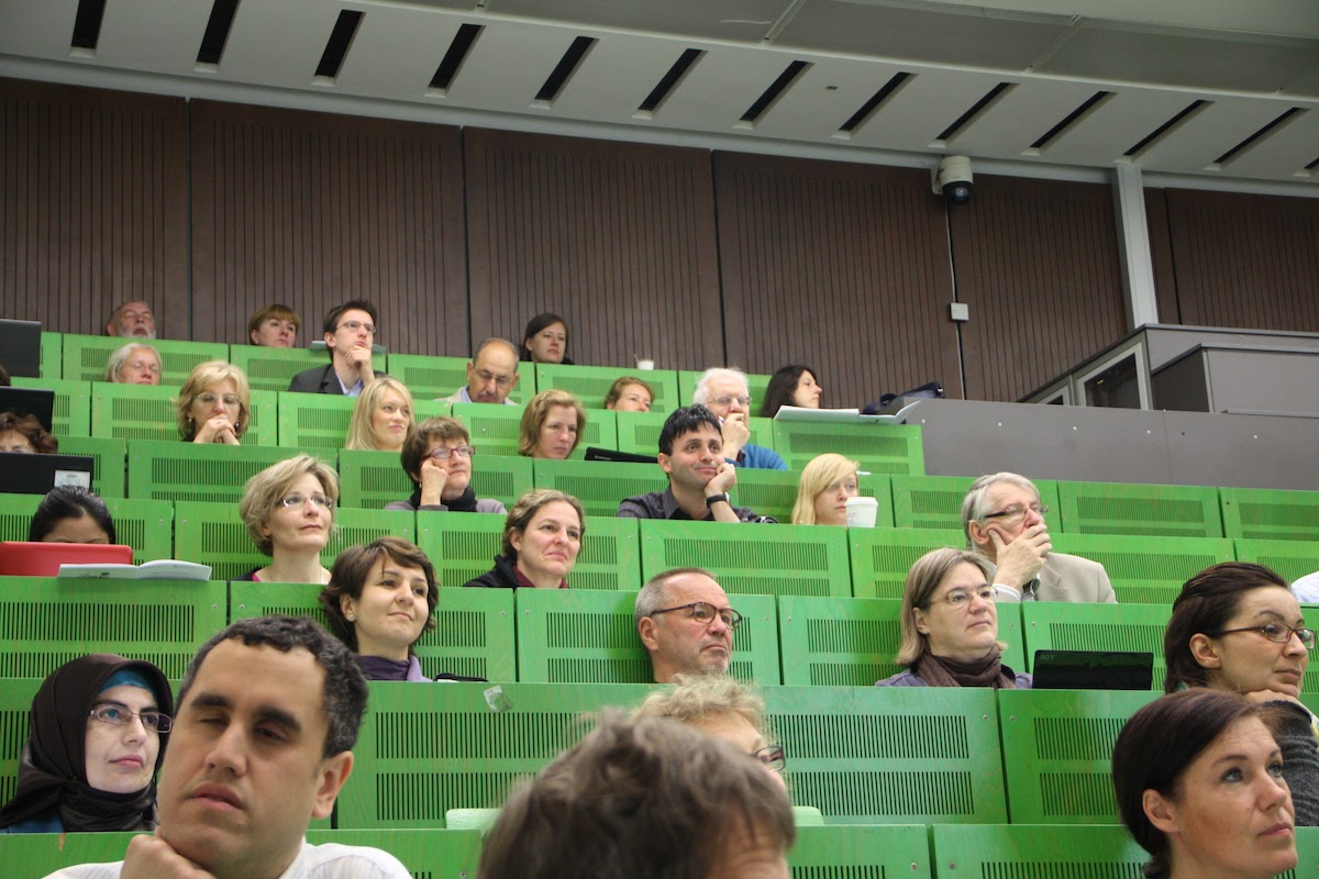 Networking and discussions with international colleagues during the break.